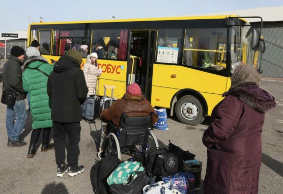 People outside a bus, Lviv in Ukraine